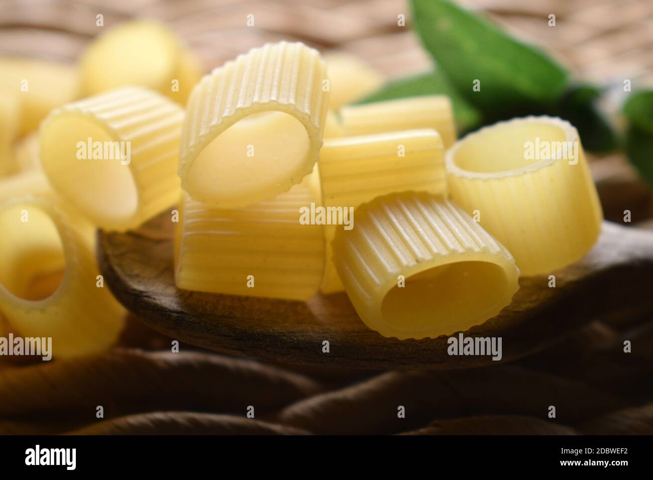 Uncooked Mezze maniche rigate italian pasta Stock Photo
