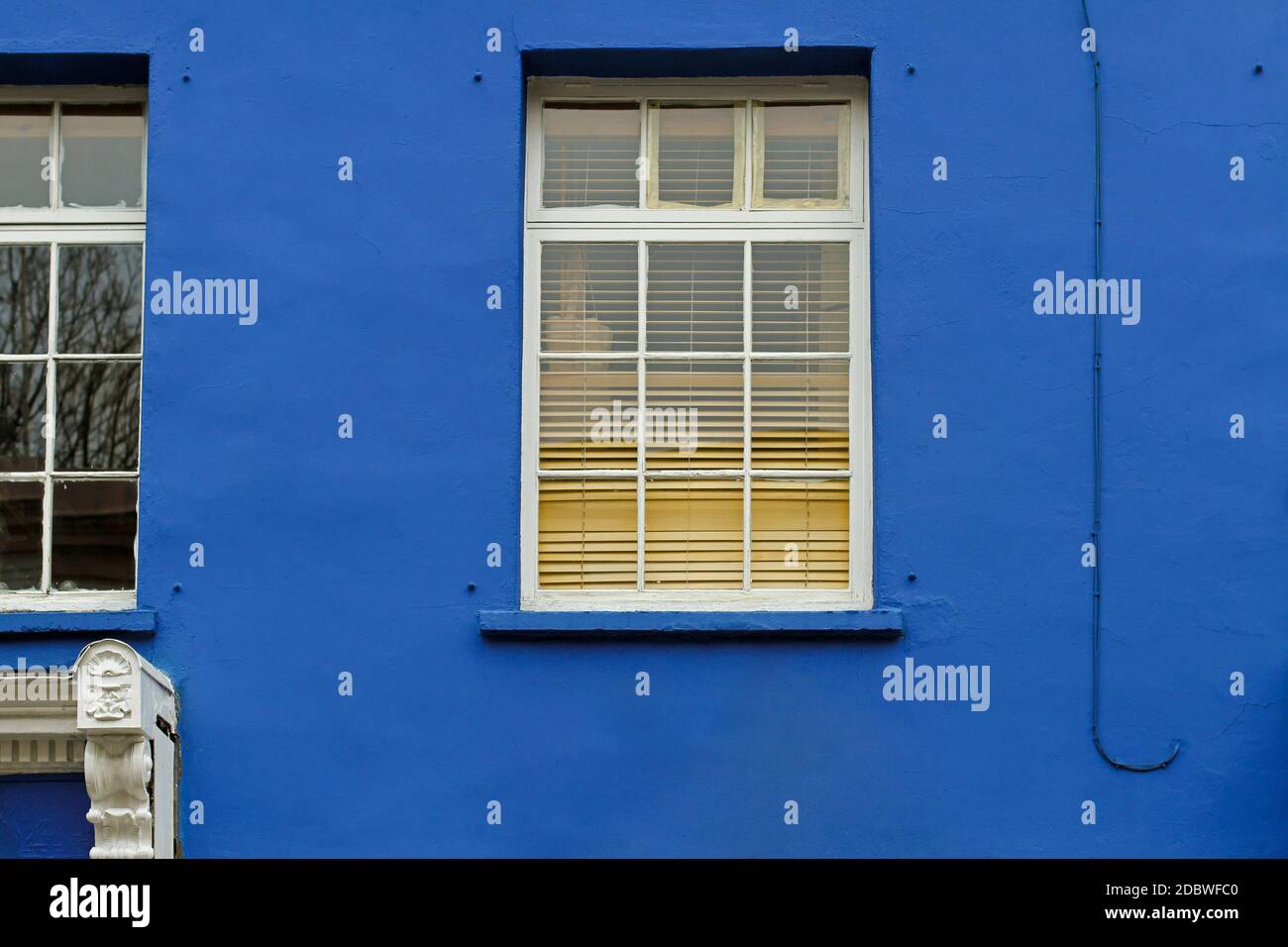 Old house with blue facade and window Stock Photo - Alamy