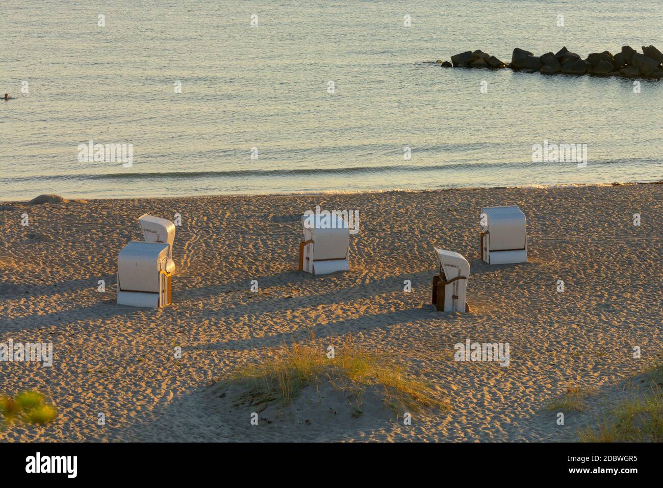 Beach chair on the Baltic Sea coast. In Travemuende, Germany Stock Photo