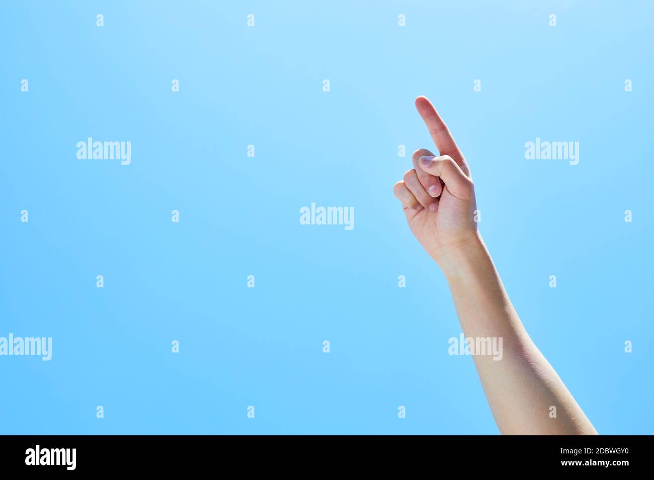 Raised Hand To The Sky Stock Photo - Alamy
