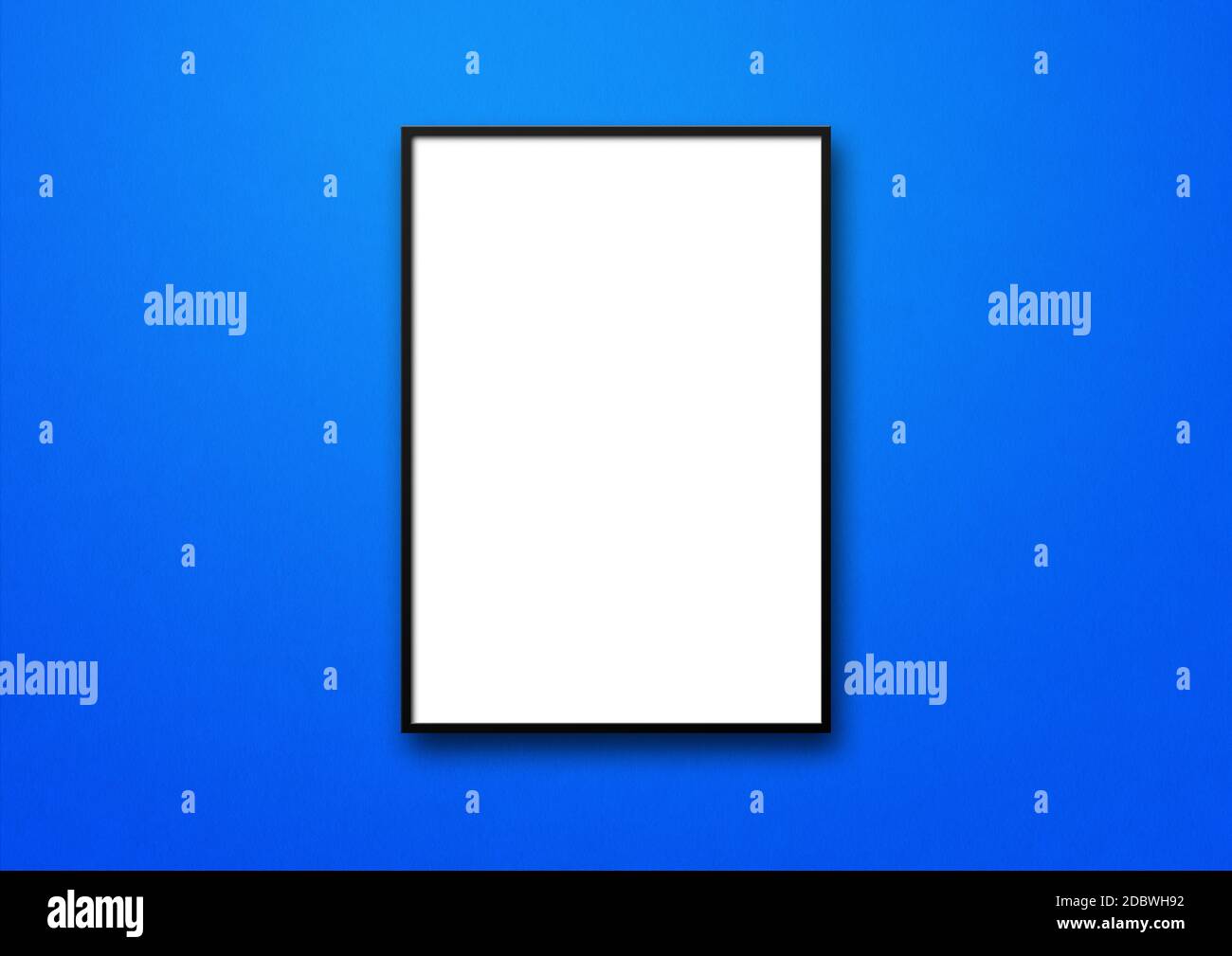 Black picture frame hanging on a blue wall. Blank mockup template Stock ...
