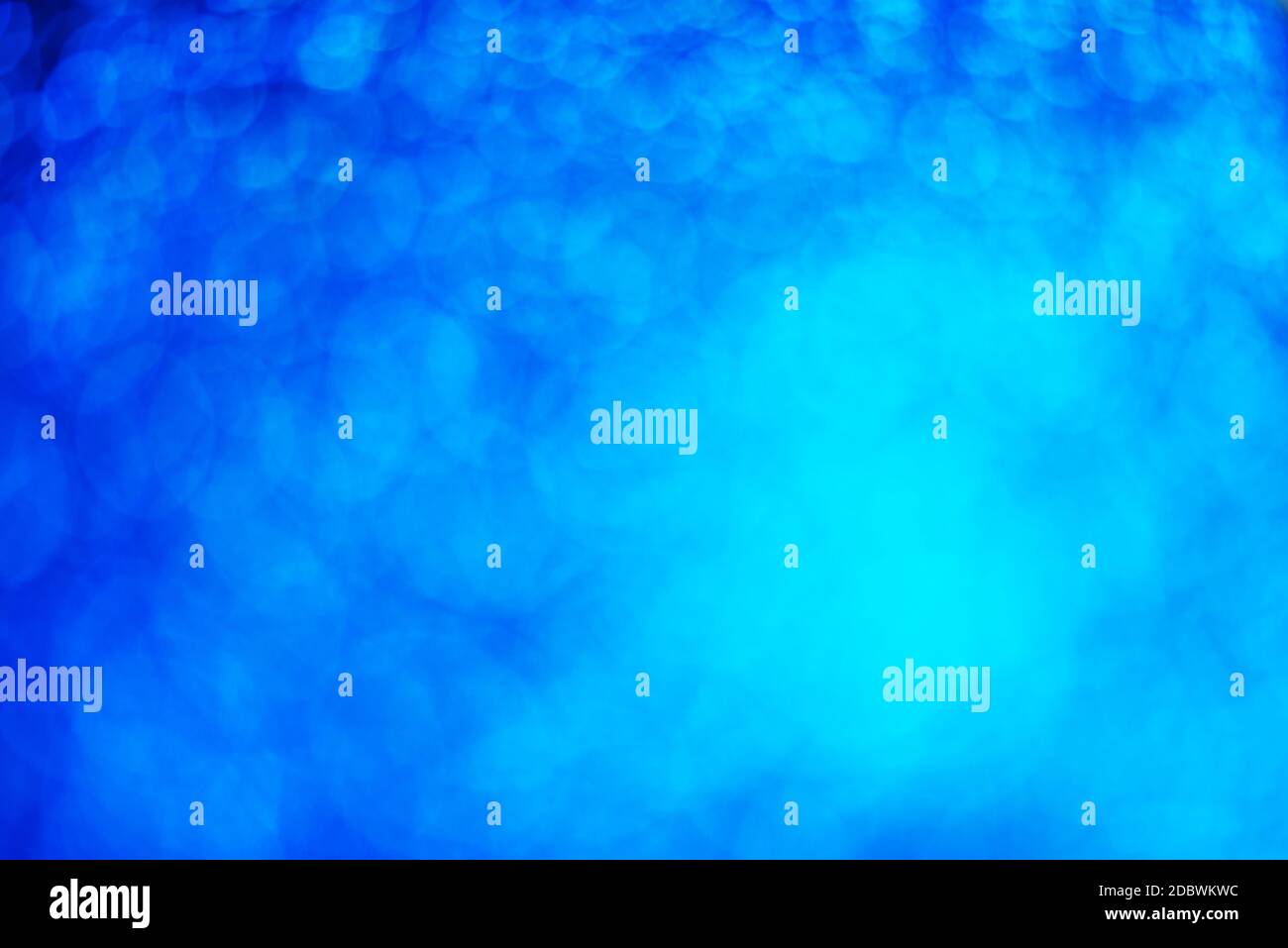 Glitter light abstract blue bokeh light blurred background Stock Photo ...