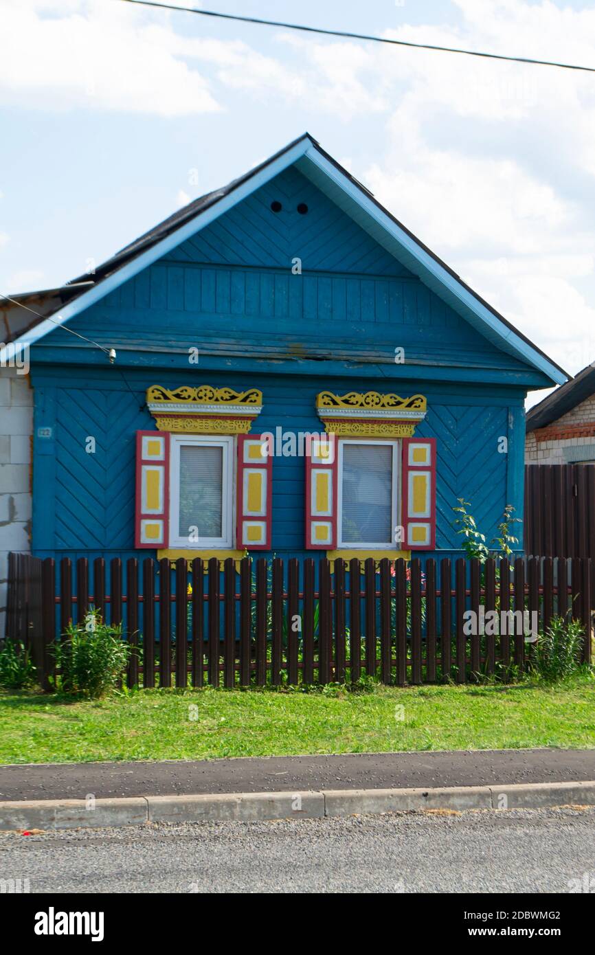 Traditional village in Belarus. Wooden folk architecture, facade with ...