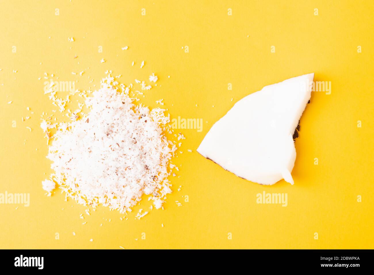 Happy coconuts day concept, fresh coconut group set different half and slices, studio shot isolated on yellow background Stock Photo