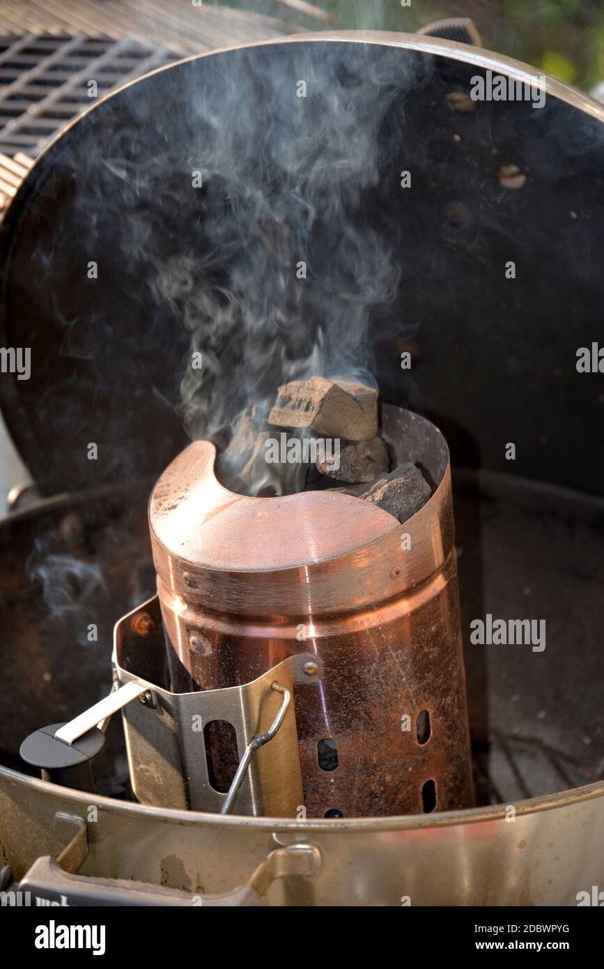 charcoal container at the barbecue Stock Photo Alamy