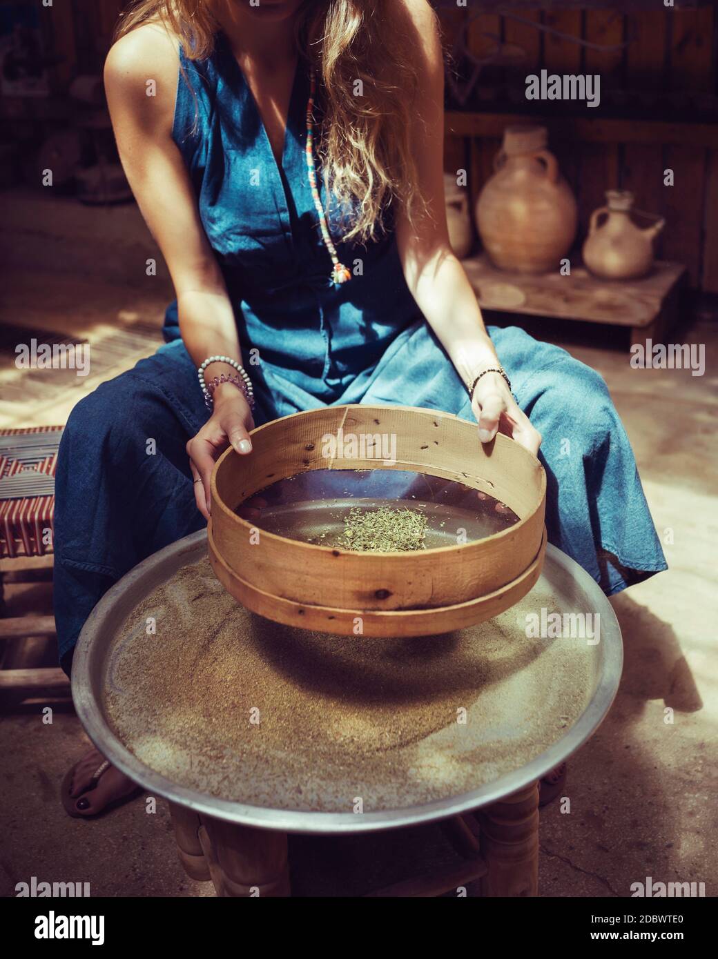 Woman Making Homemade Spices, Dry Zaatar. Traditional Lebanese