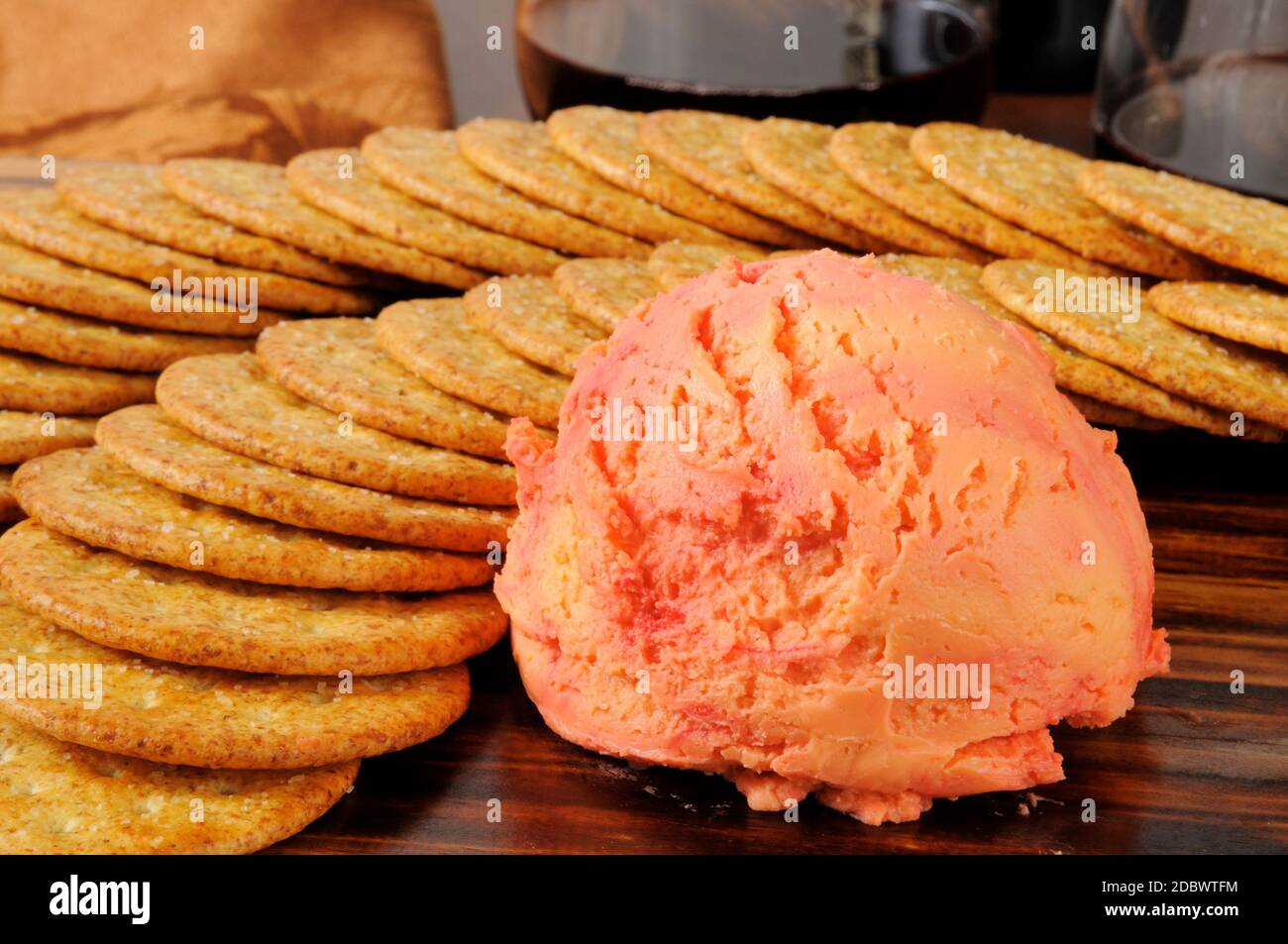 Cheddar cheese and port wine cheese ball with crackers Stock Photo Alamy