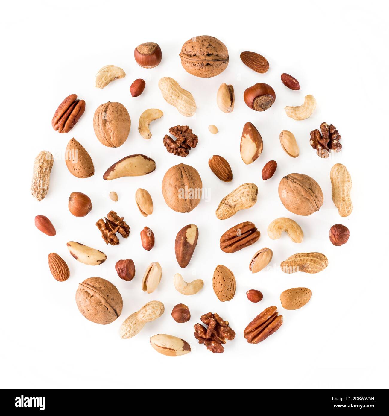 Pattern of nuts in circle form. Various nuts isolated on white. pecan