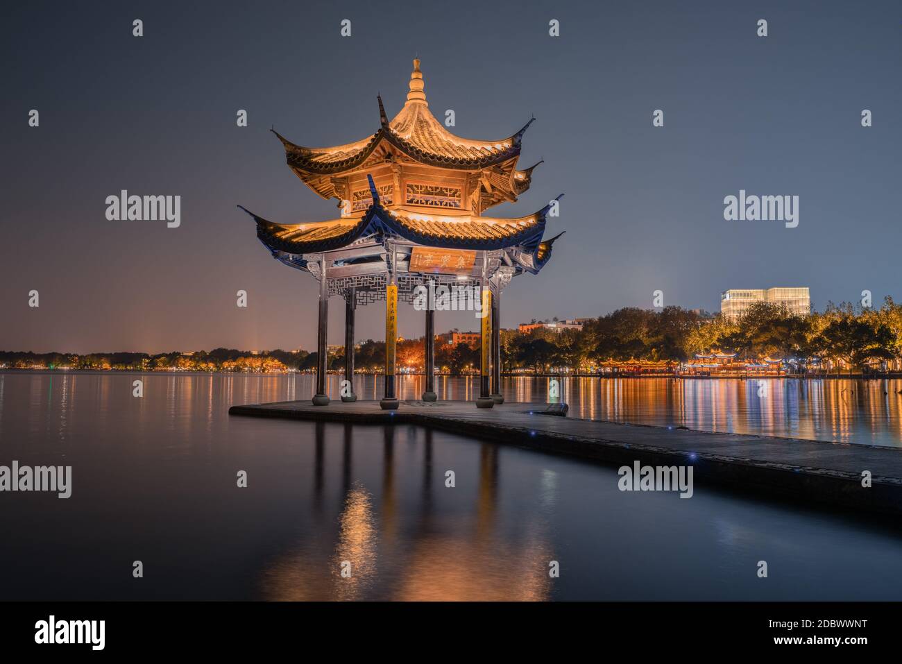 Night view of Jixian pavilion, the landmark at the West Lake in Hangzhou, China, Stock Photo