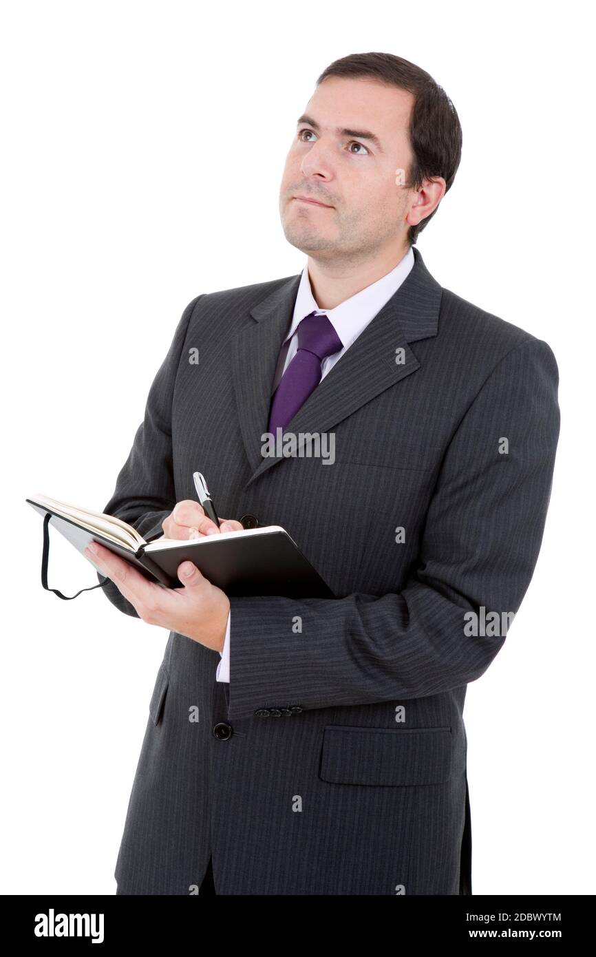 young businessman writing in a book in white background Stock Photo - Alamy