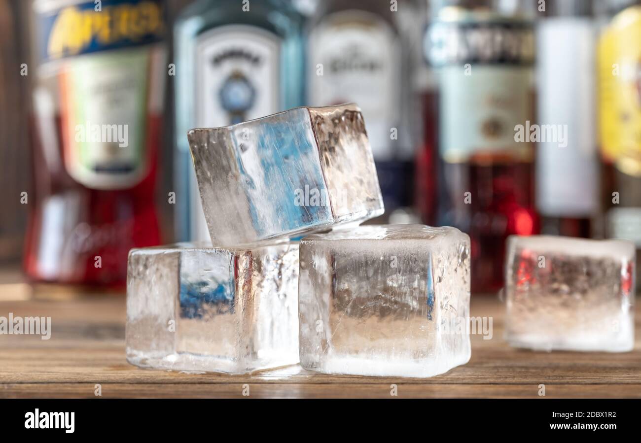 Crystal clear ice cubes on the bar counter Stock Photo
