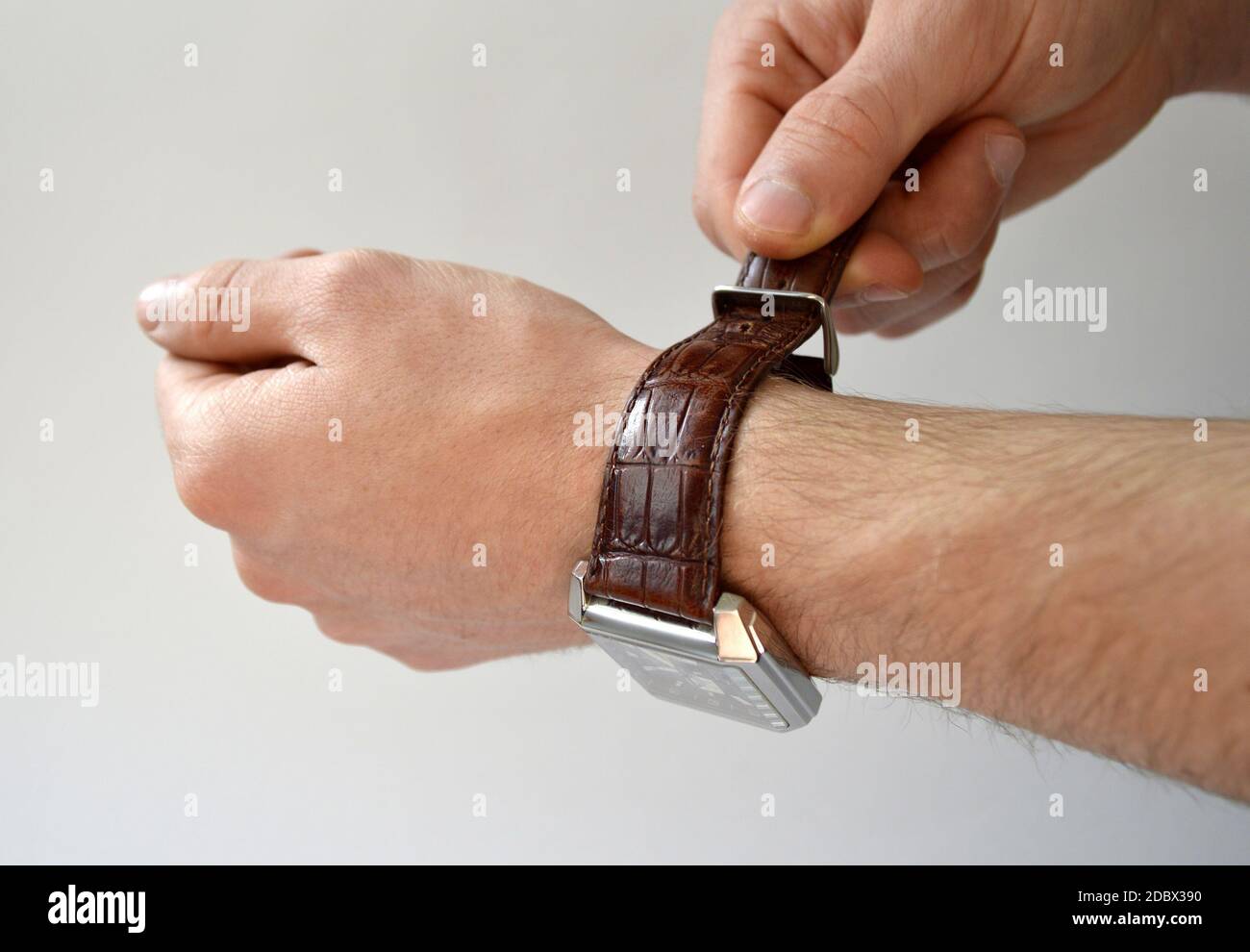 Fastening leather wrist watch strap isolated on white background Stock