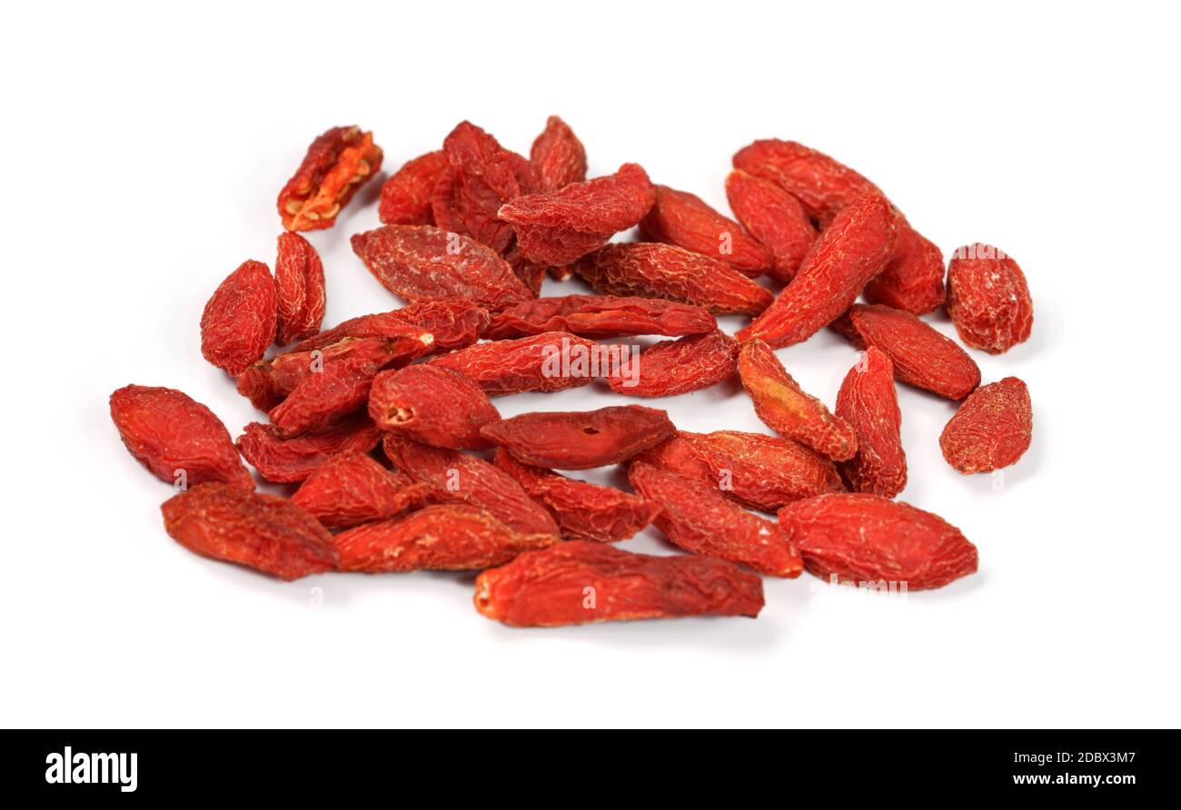 Closeup photo of goji berry wolfberry - Lycium chinense dried fruits isolated on white background. Stock Photo