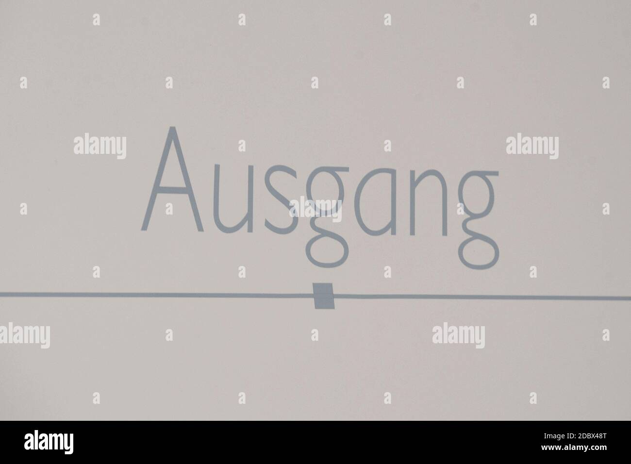 Exit Ausgang Sign On A Door Gray Letters Escape Route Stock Photo
