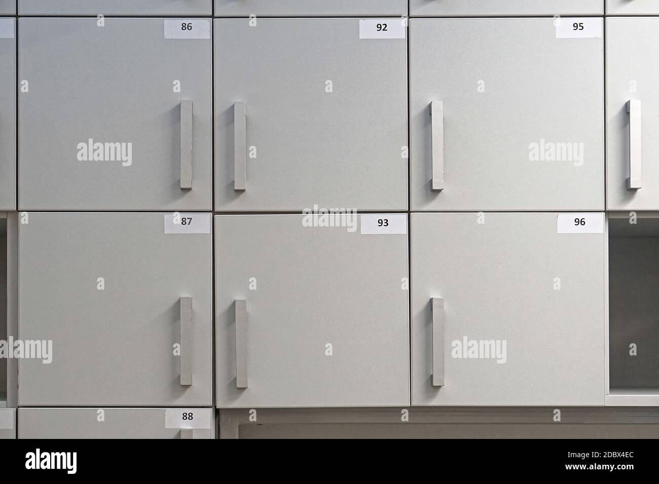 Small lockers storage compartments with numbers Stock Photo - Alamy