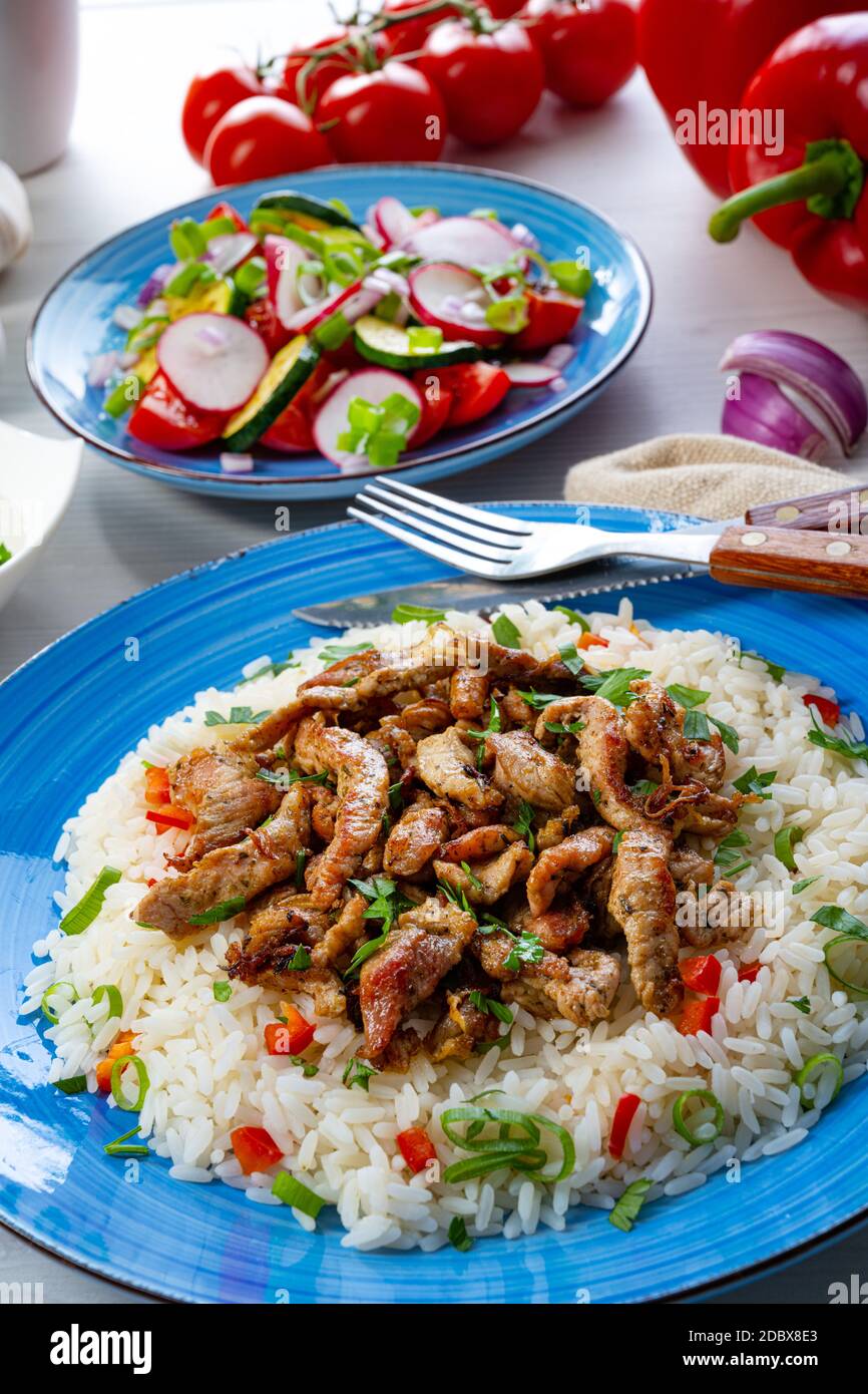 gyros with rice and green salad and zaziki Stock Photo