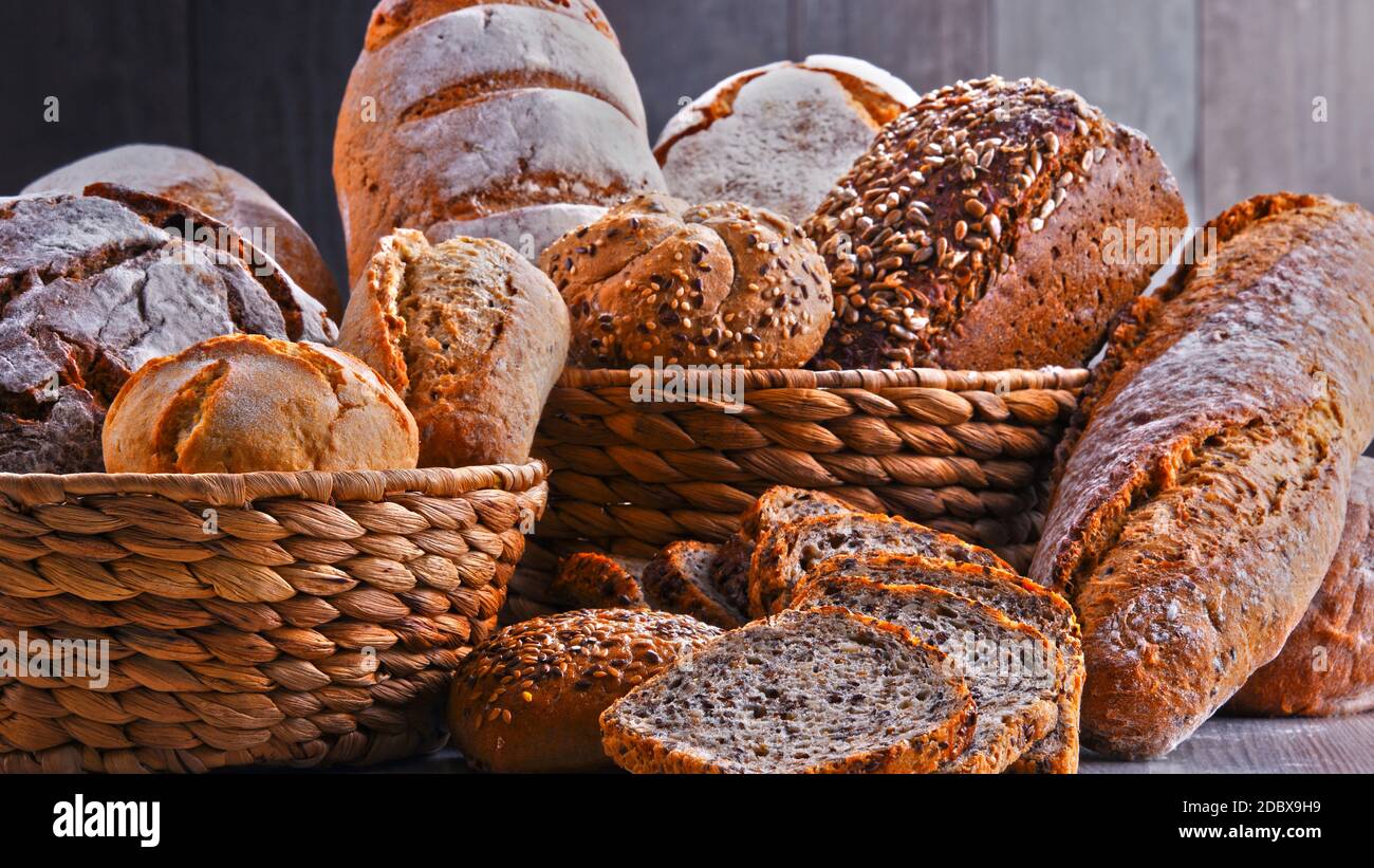 Composition with assorted bakery products in wicker basket Stock Photo
