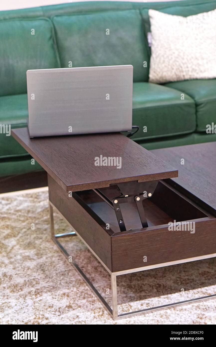 Work at home coffee table desk combo Stock Photo Alamy