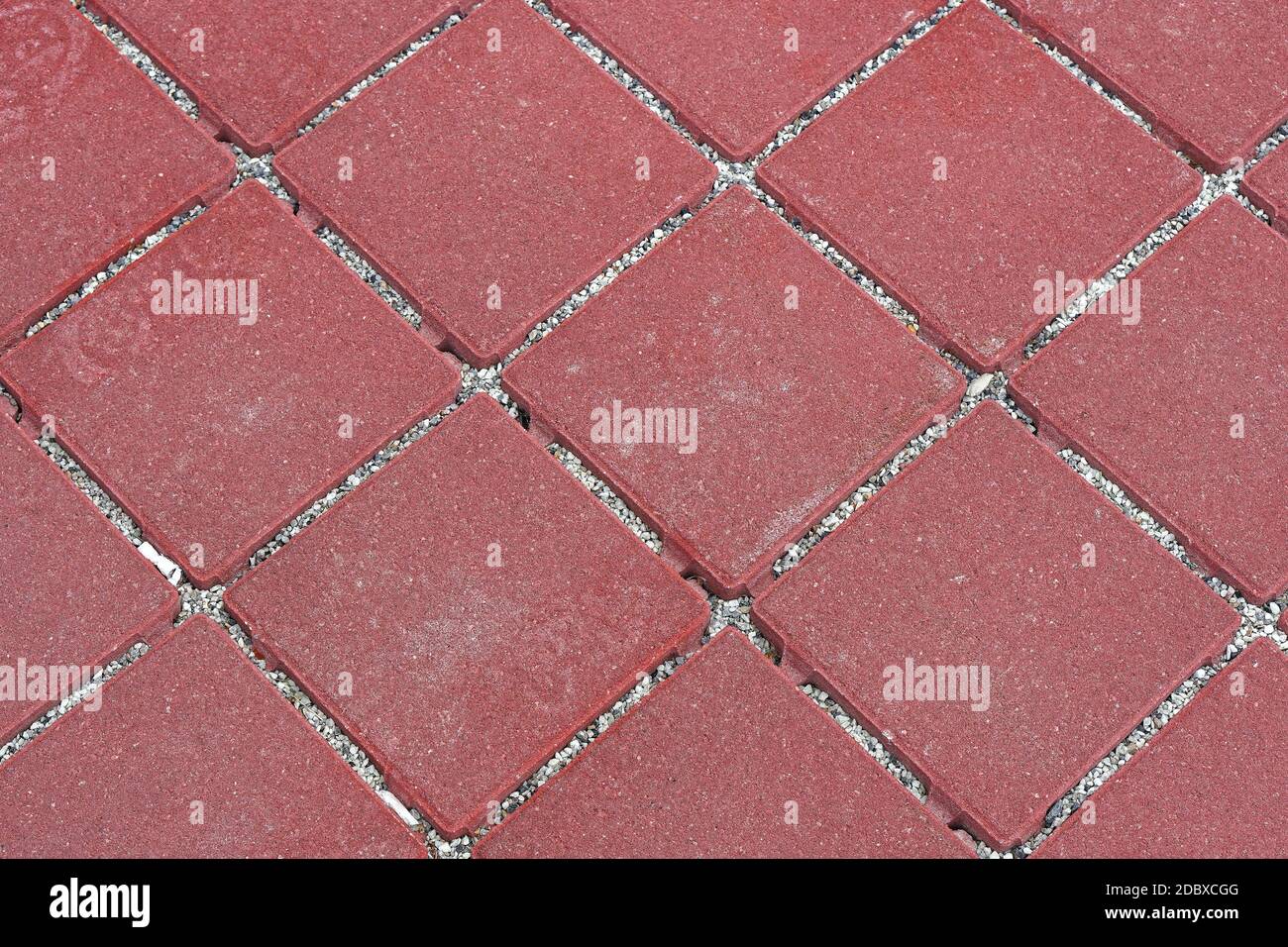 Red mosaic stone outdoor patio floor tiles Stock Photo Alamy