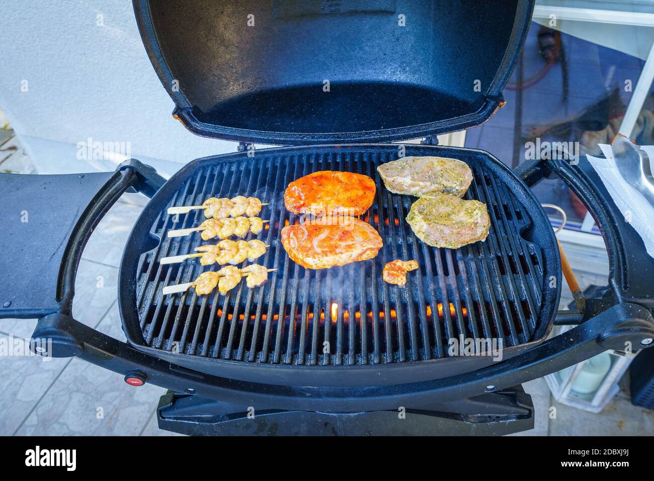 Steak and Fish on a Gas Grill Stock Photo Alamy