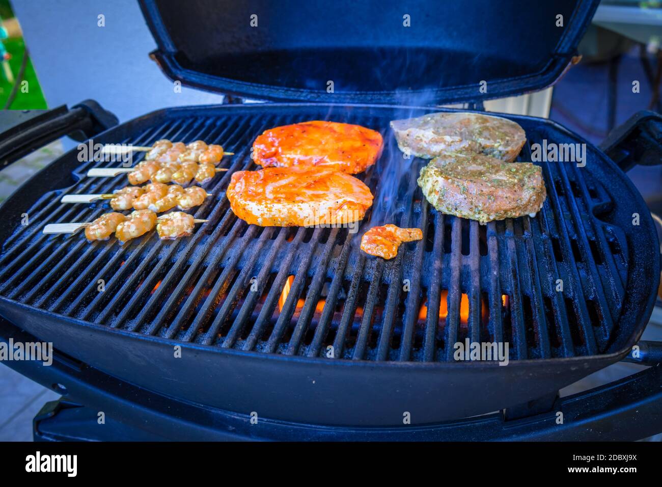 Steak and Fish on a Gas Grill Stock Photo Alamy