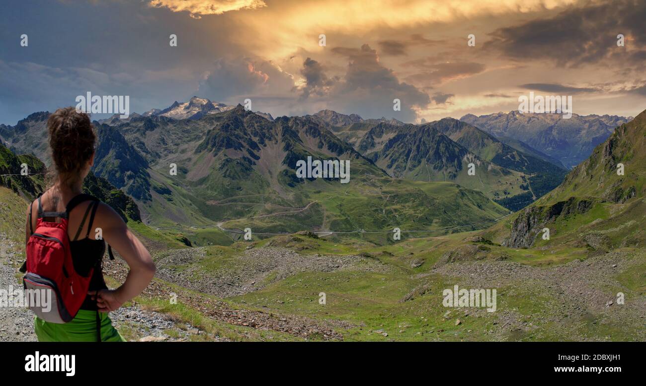 a young woman looking Col du tourmalet in the french Pyrenees Stock Photo
