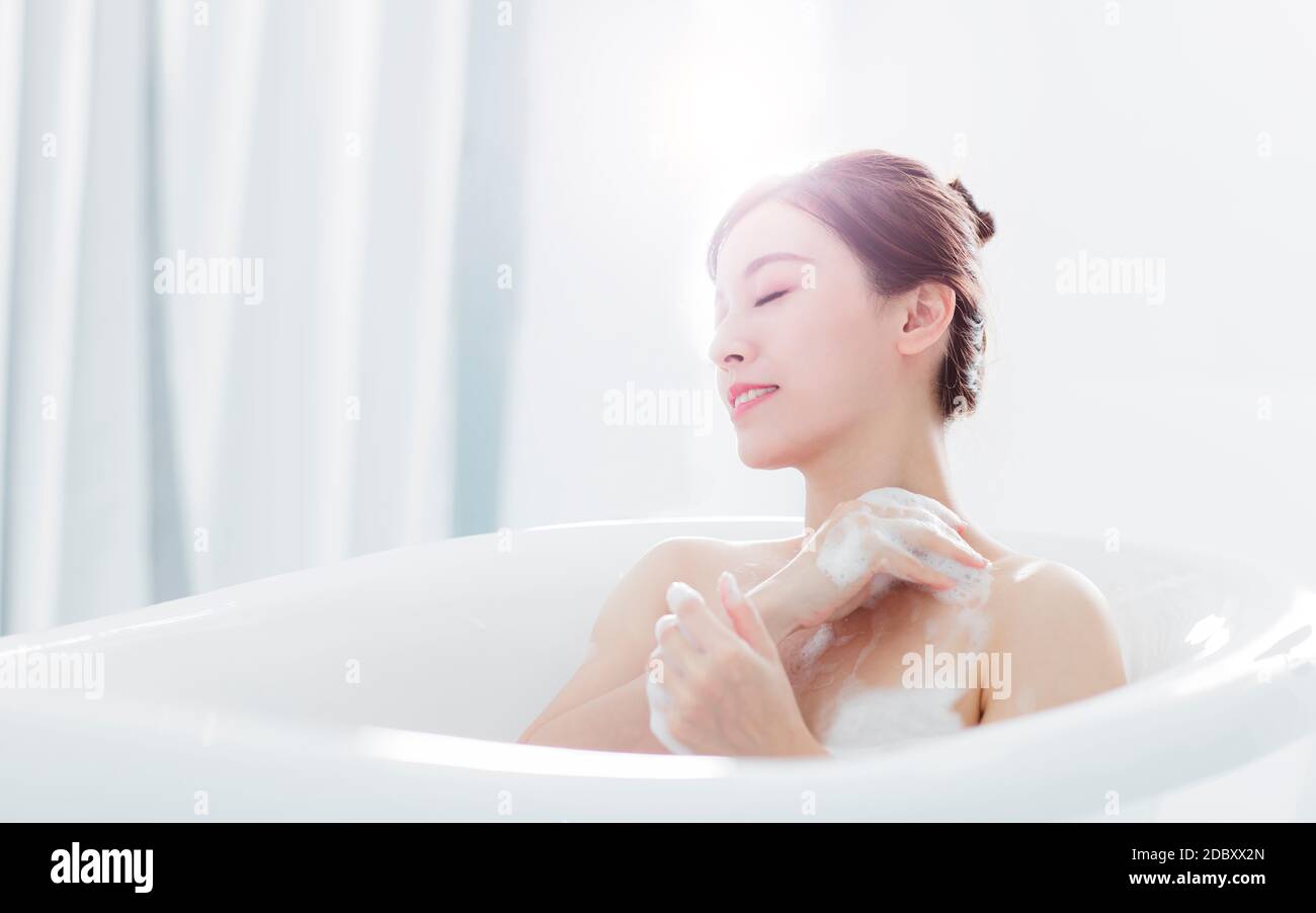 young woman take a bath in bathtub Stock Photo Alamy