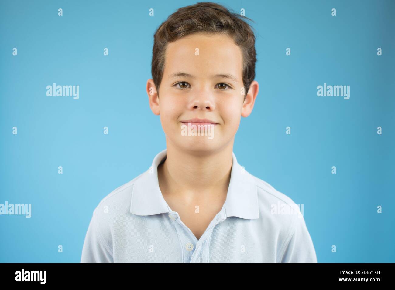 Photo of adorable young happy boy looking at camera Stock Photo - Alamy
