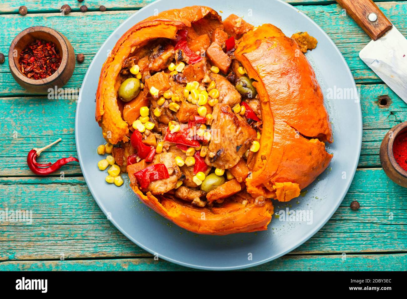 Meat with vegetables baked in pumpkin.Mexican pork. Stock Photo