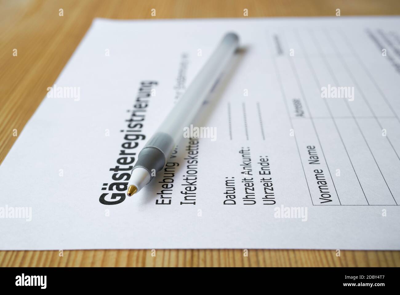 Form for guest registration (GÃ¤steregistrierung) in a restaurant in Germany during the Corona pandemic Stock Photo