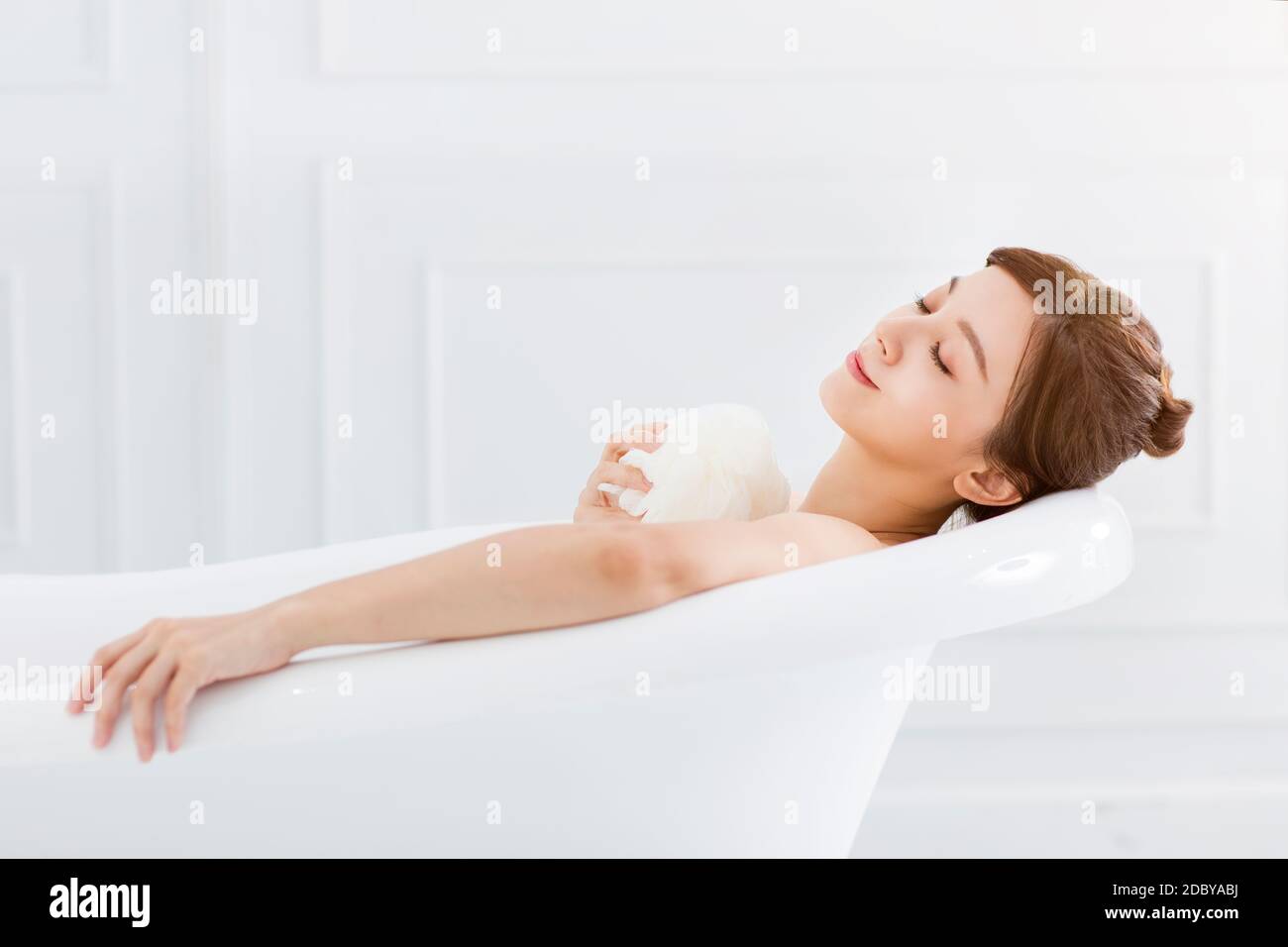young woman take a bath in bathtub Stock Photo Alamy