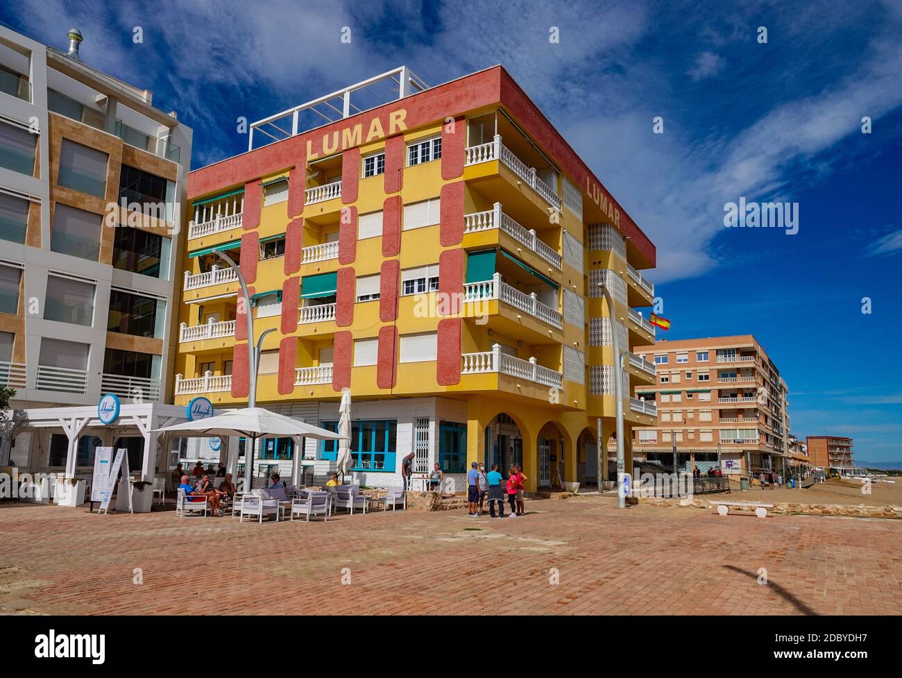 Colourful building and cafe with gazebo, near the beach, La Mata, Torrevieja, Costa Blanca, Alicante, Spain Stock Photo