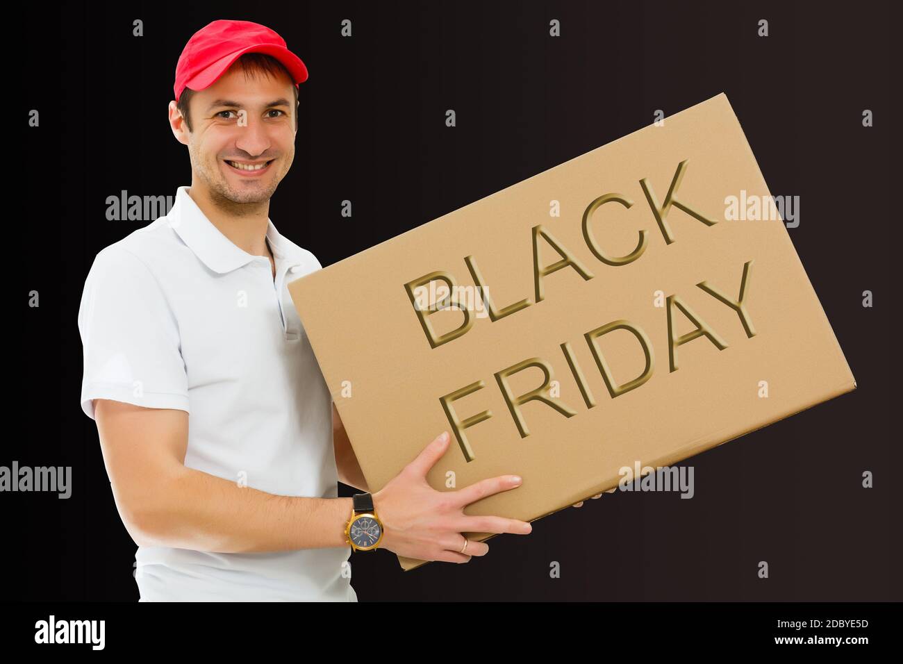 black friday and the delivery man. Delivery concept. Delivery service concept. Copy space. Black friday concept. Stock Photo