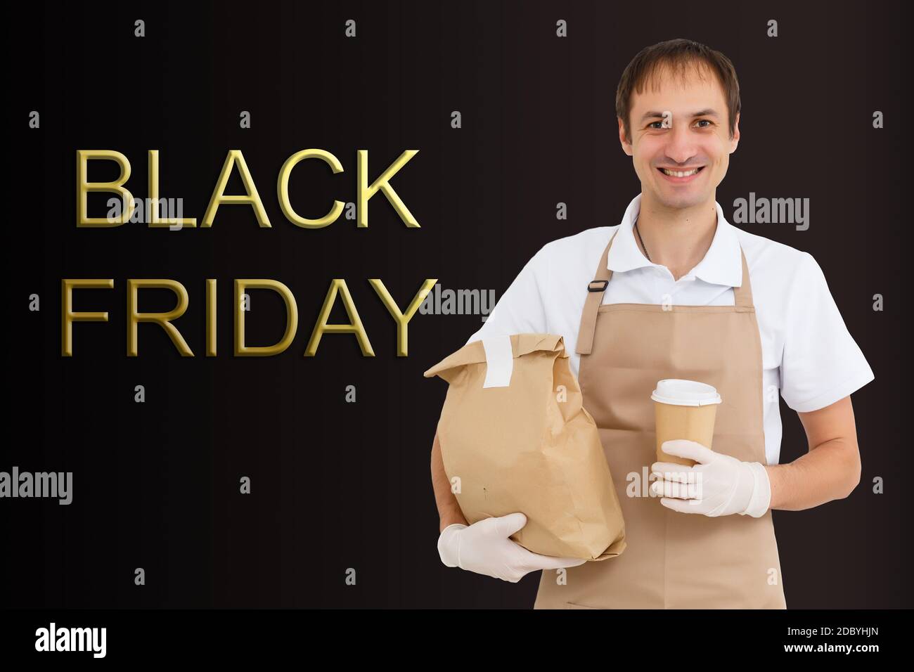 black friday and the delivery man. Delivery concept. Delivery service concept. Copy space. Black friday concept. Stock Photo