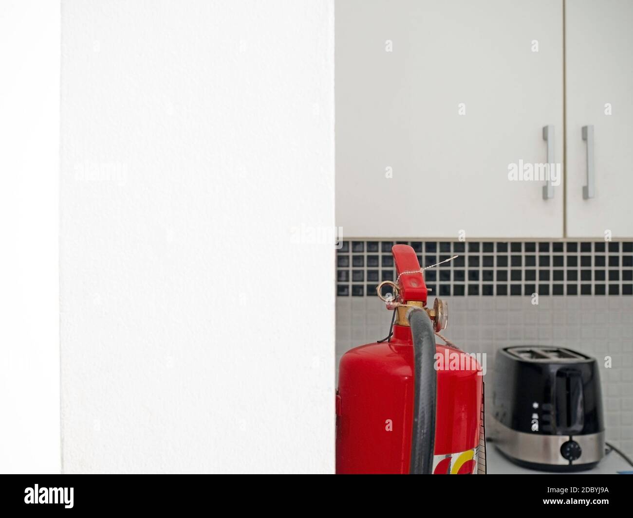 Image of fire extinguishers in the kitchen Stock Photo