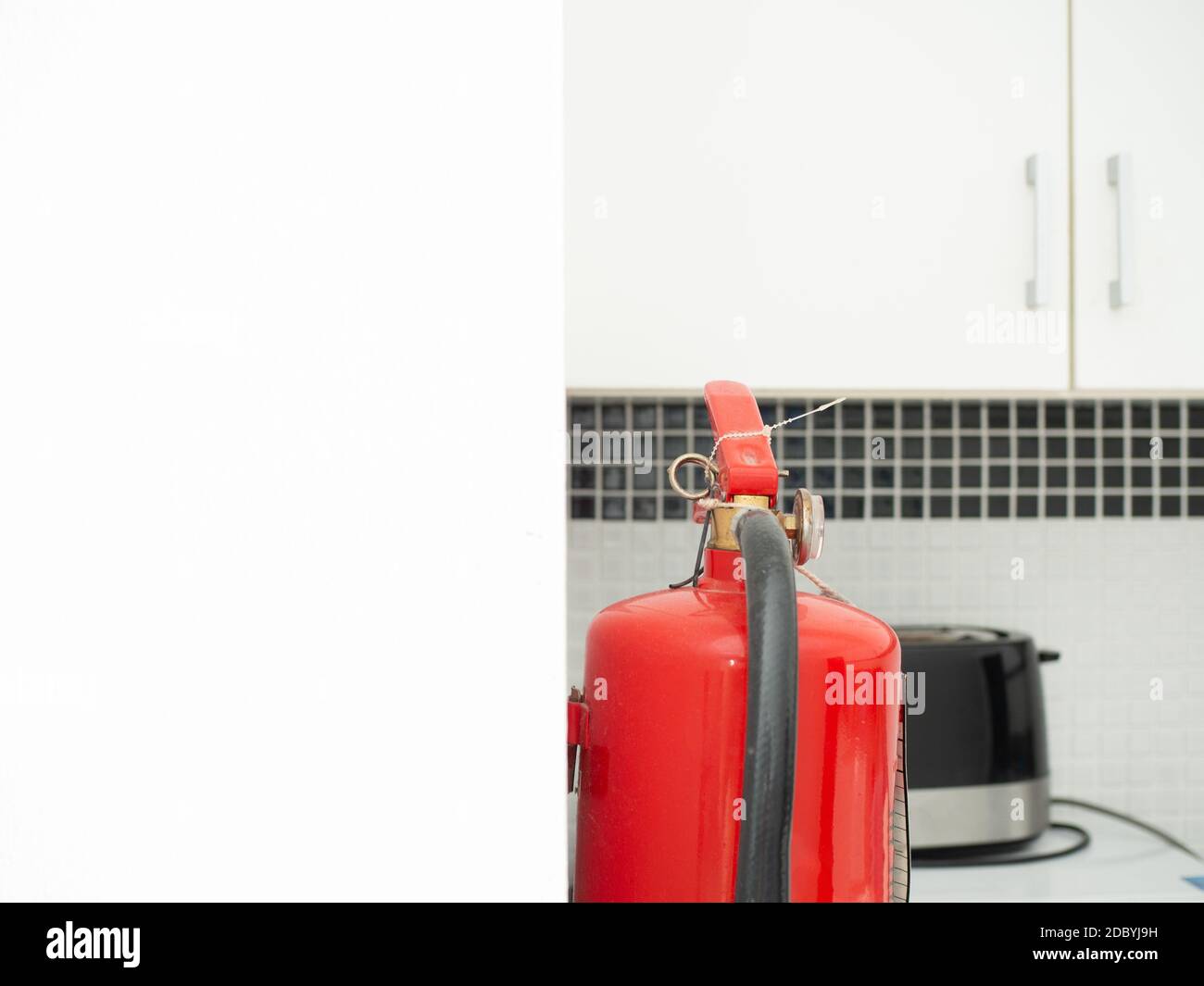 Image of fire extinguishers in the kitchen Stock Photo