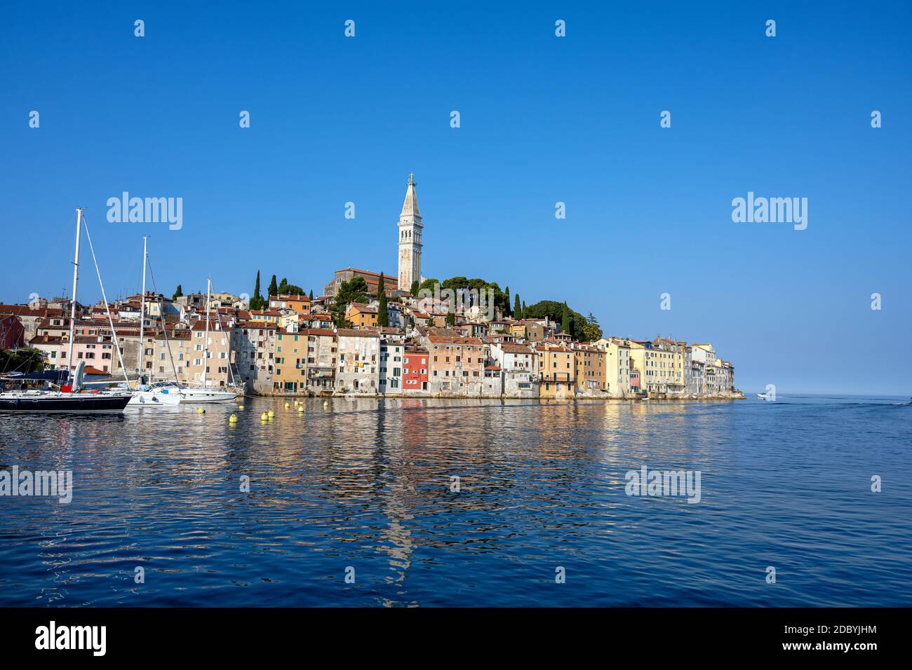 The beautiful old town of Rovinj in Croatia with the iconic church tower Stock Photo