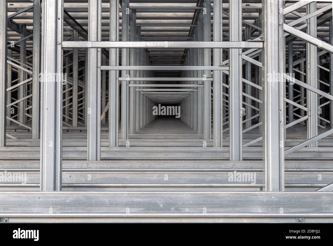 Steel structure of a high rack warehouse Stock Photo - Alamy