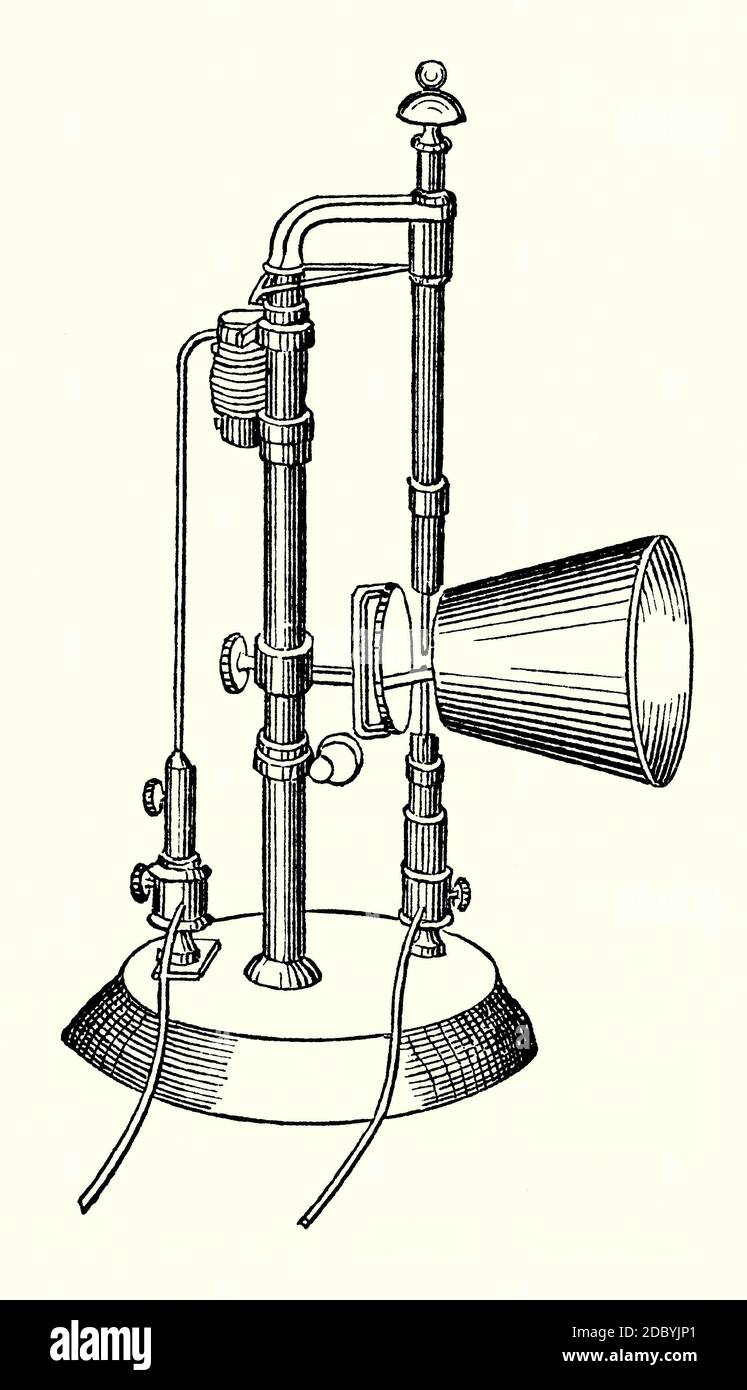 An old engraving of an early example of an electric light c.1870. It is from a Victorian book of the 1880s. English chemist Humphry Davy developed the first incandescent light in 1802, followed by the first practical electric arc light in 1806. Two pieces of pure carbon have electricity from a powerful battery passed through them. An arc is created and the carbon burns – as well as creating heat, light is also emitted. This example by London instrument-maker John Browning has a magnetic device to maintain a constant distance for the arc and a mirror and small shade to direct the light. Stock Photo