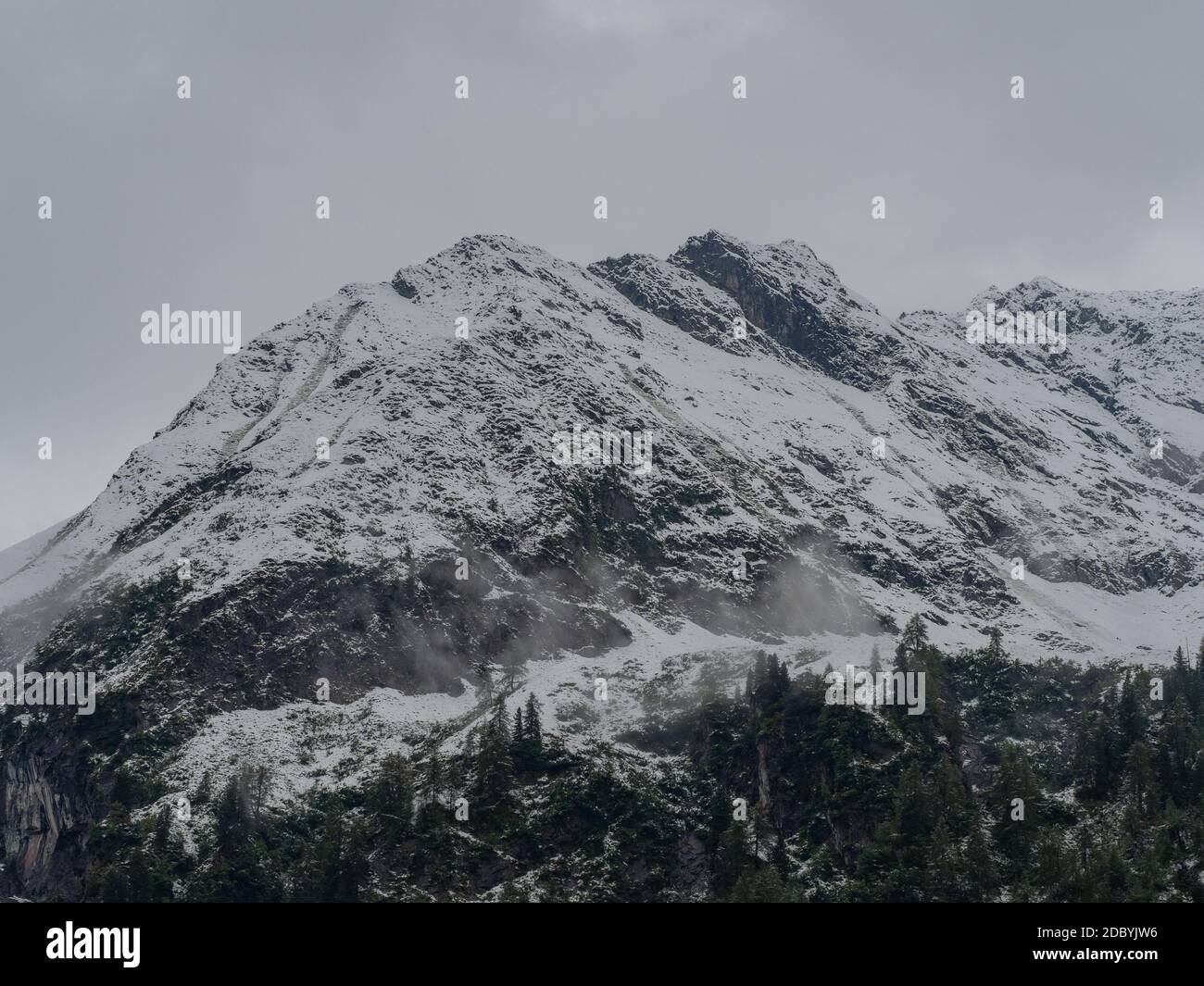 Mountain top on a foggy day Stock Photo - Alamy