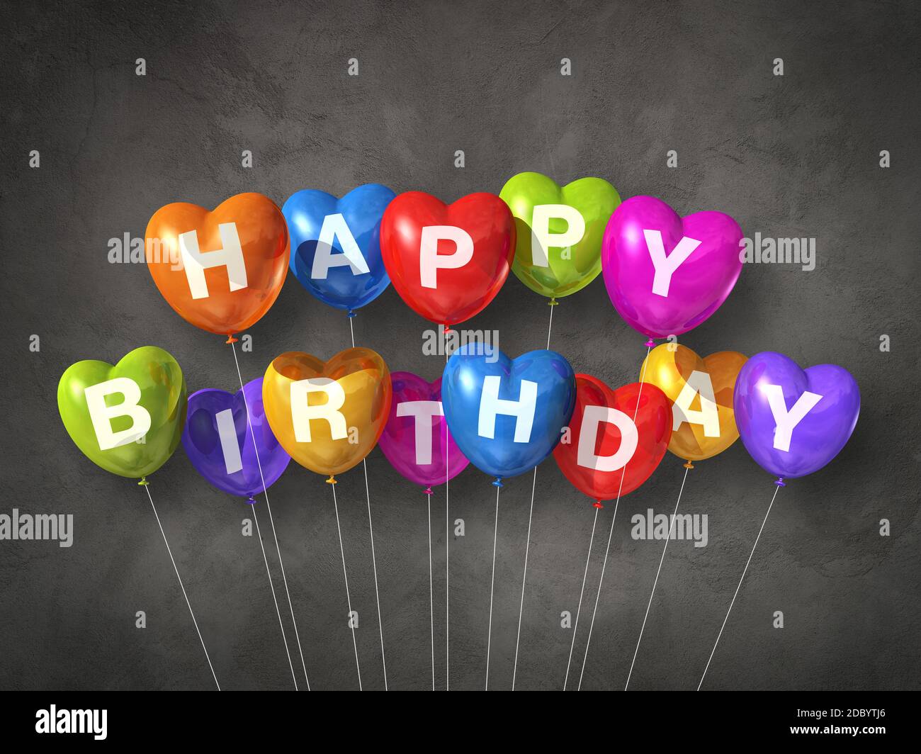 Colorful happy birthday heart shape air balloons on a concrete ...