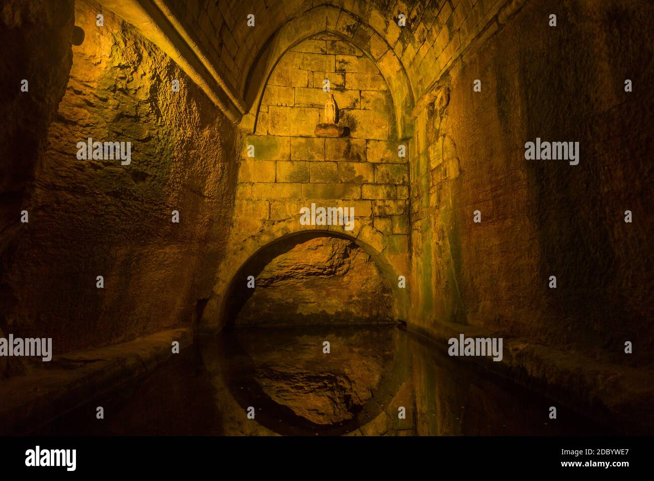 fountain at night in Sarlat la Caneda a beautiful medieval town and one of  the highlights to a visit to the Dordogne Perigord Stock Photo - Alamy