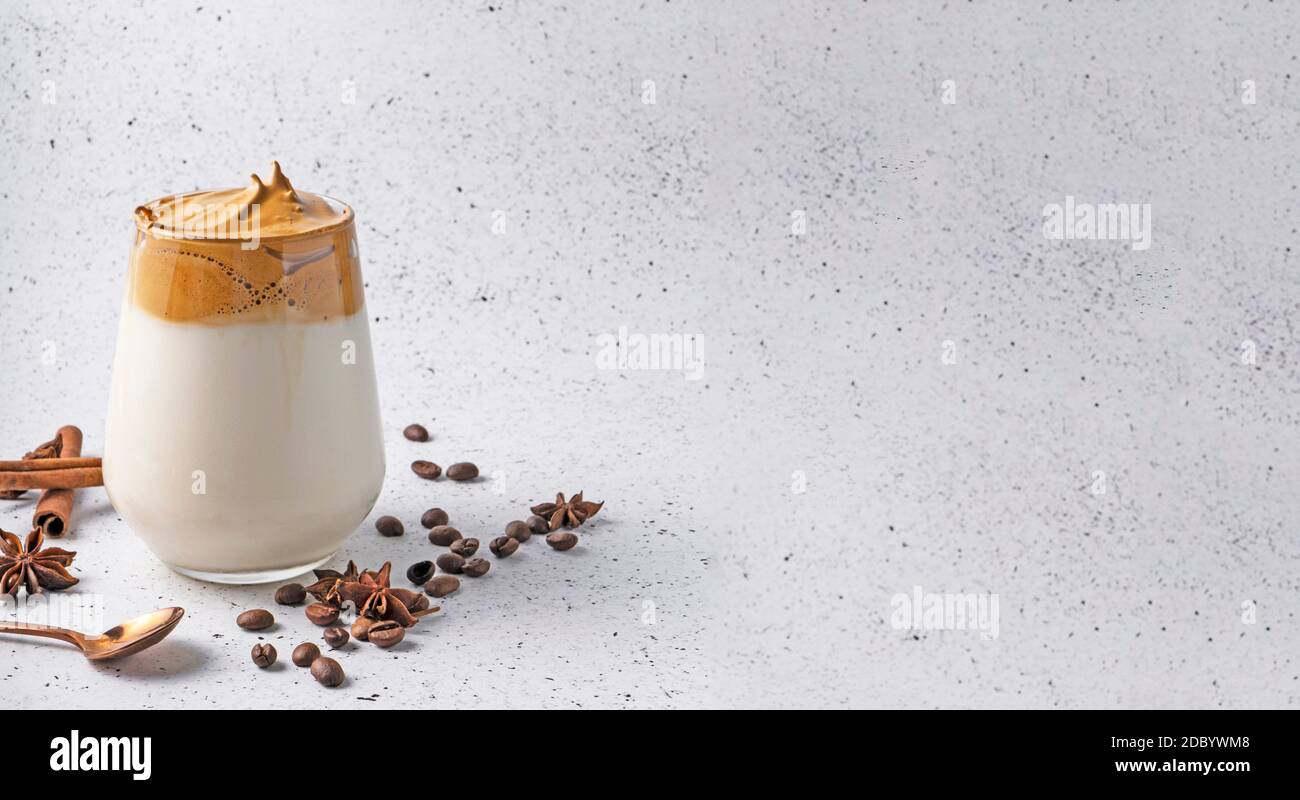 selective focus, Korean drink, dalgona coffee. with cold milk, sweet strong foam with sugar, banner Stock Photo