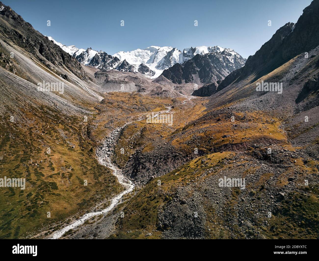 Aerial view of the river in the mountain valley in Tien Shan mountains in Almaty Kazakhstan. Picture taken by drone Stock Photo