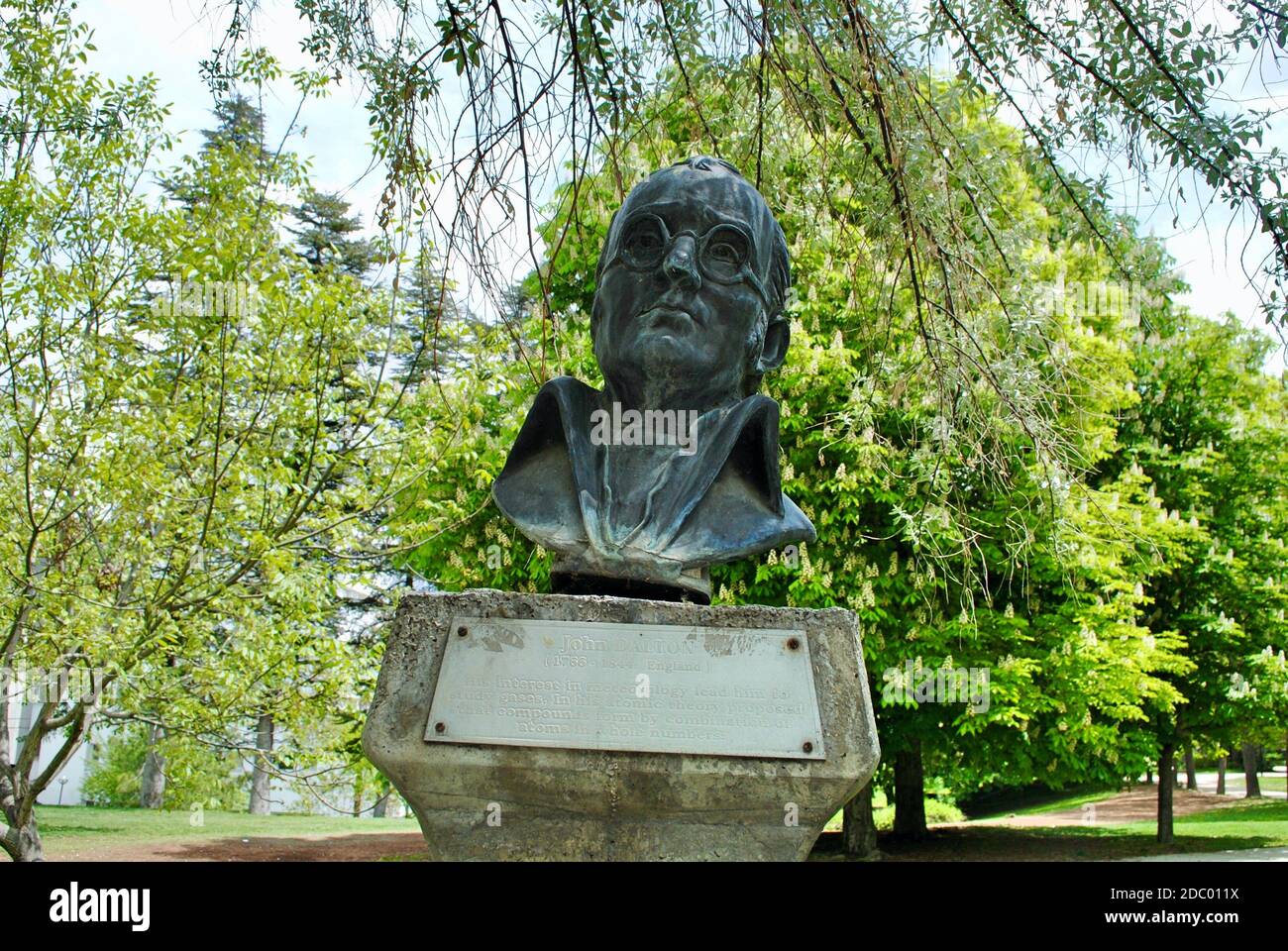 The Bust of John Dalton with English explanation plate at METU greenery campus. Dalton is an English scientist, best known for introducing the atomic Stock Photo