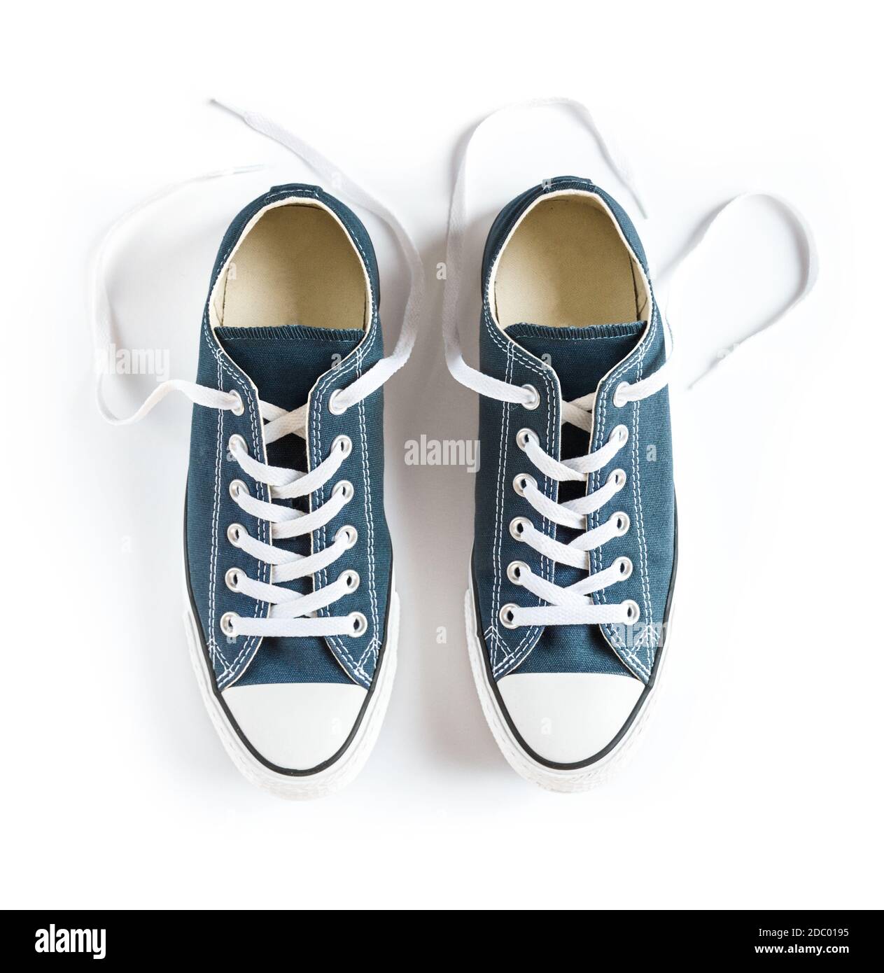 Blue generic sneakers isolated on white background Stock Photo - Alamy