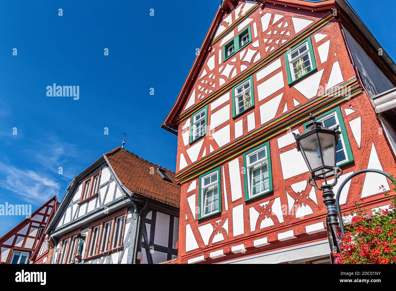 Picturesque half-timbered historic houses in Seligenstadt, Germany. The town lies on the banks of the Main and was of great importance in Carolingian times. Stock Photo