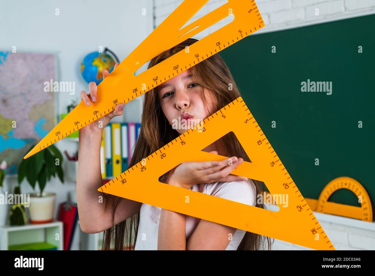 child in classroom school with geaometry triangle ruler, education ...