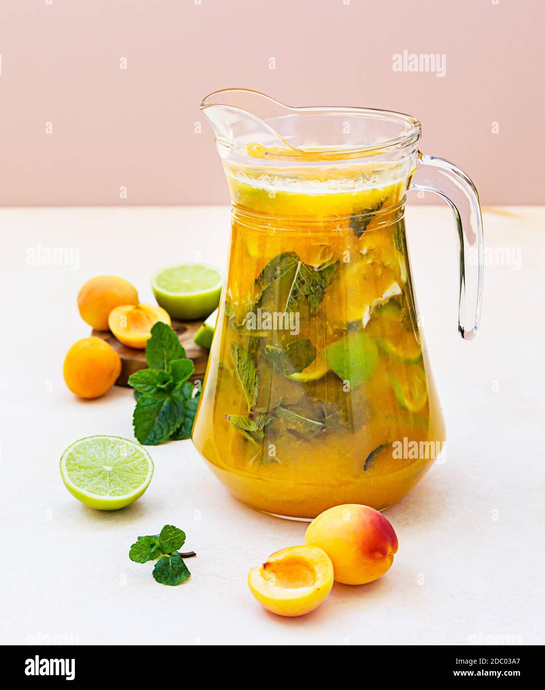 https://c8.alamy.com/comp/2DC03A7/apricot-cocktail-or-ice-tea-with-fresh-mint-lime-and-apricots-summer-refreshing-cold-drink-light-background-2DC03A7.jpg
