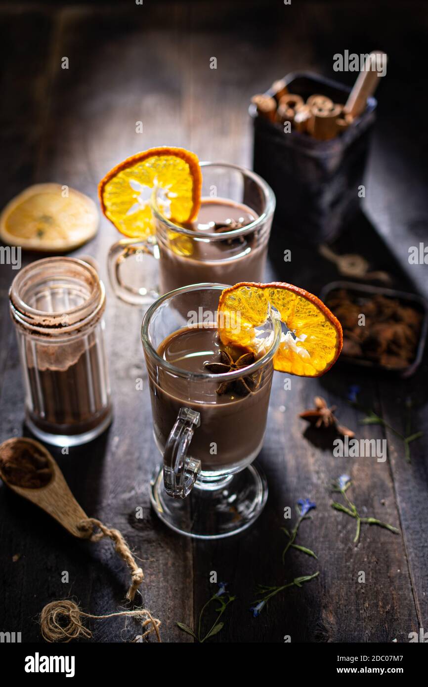 Christmas hot drink.Sweet hot chocolate with dried Orange.Delicious winter food and sweets. Stock Photo